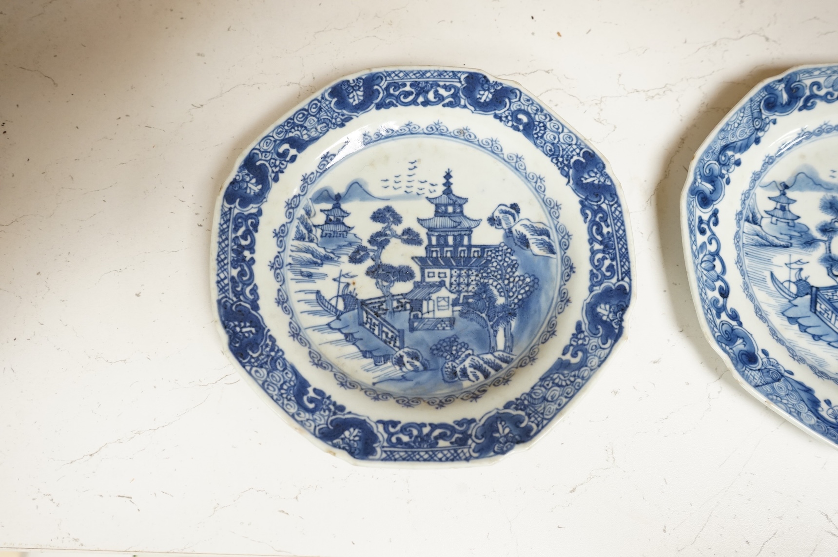 Three 18th century Chinese blue and white Export side plates, 19cm diameter